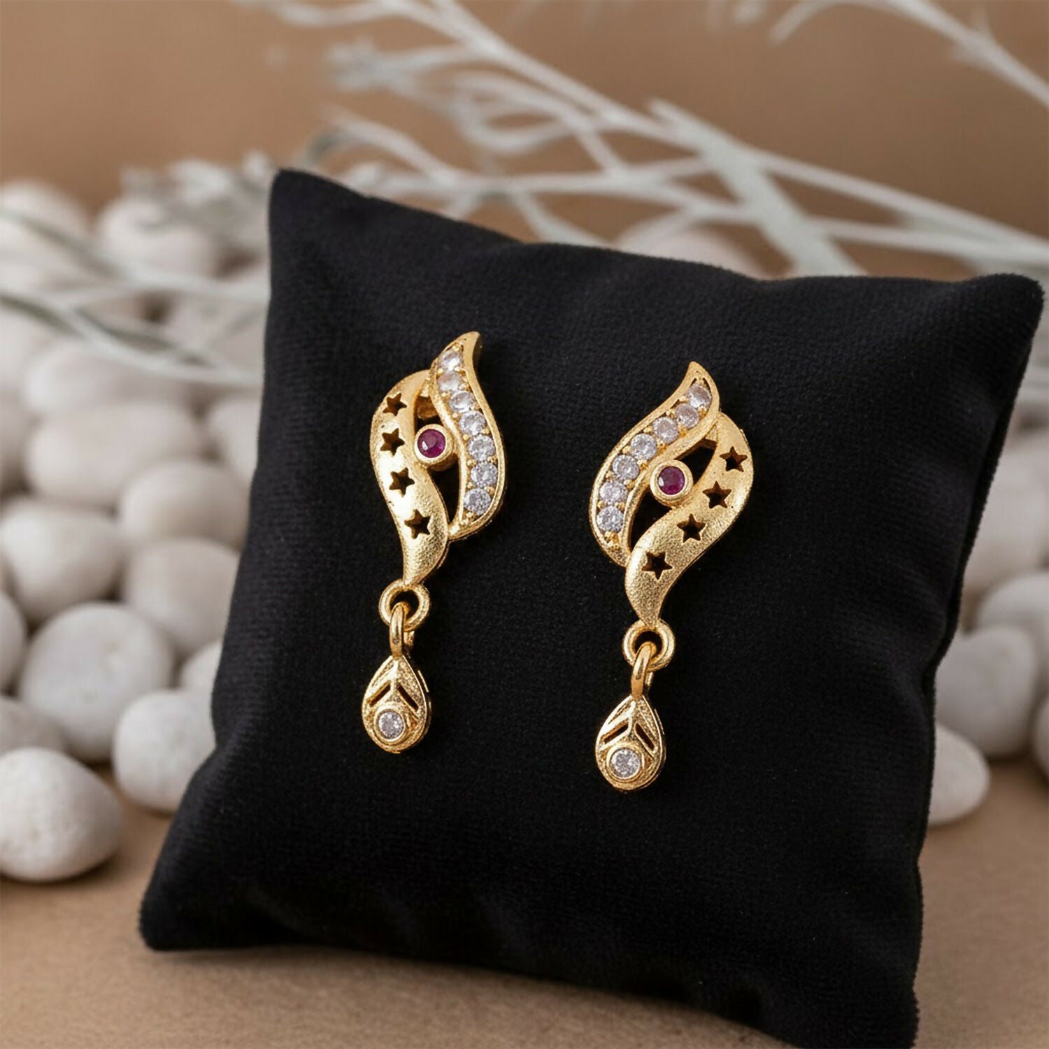 Star Cut Pattern Gold Finish Earrings With Crystal Detailing And Teardrop Charm