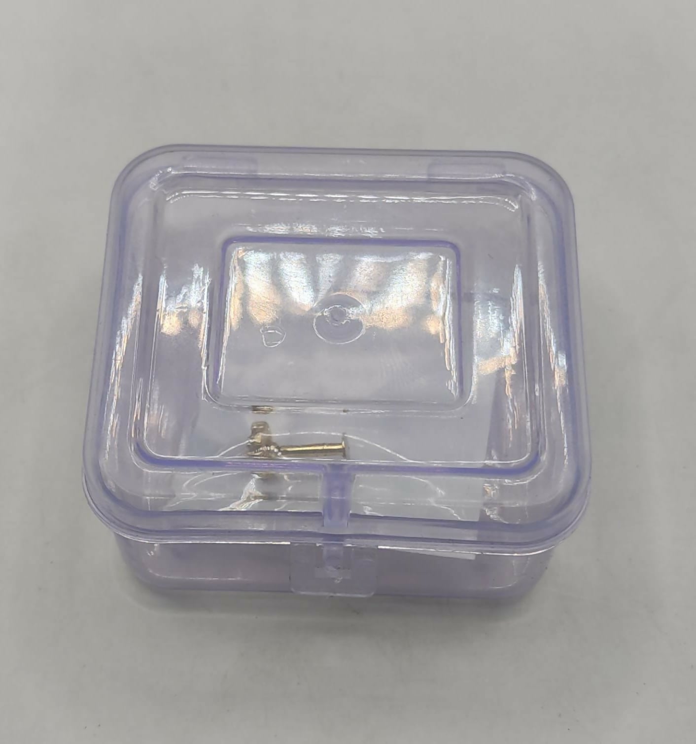 Packaged gold plated four leaf clover flat back stud earring with elegant design