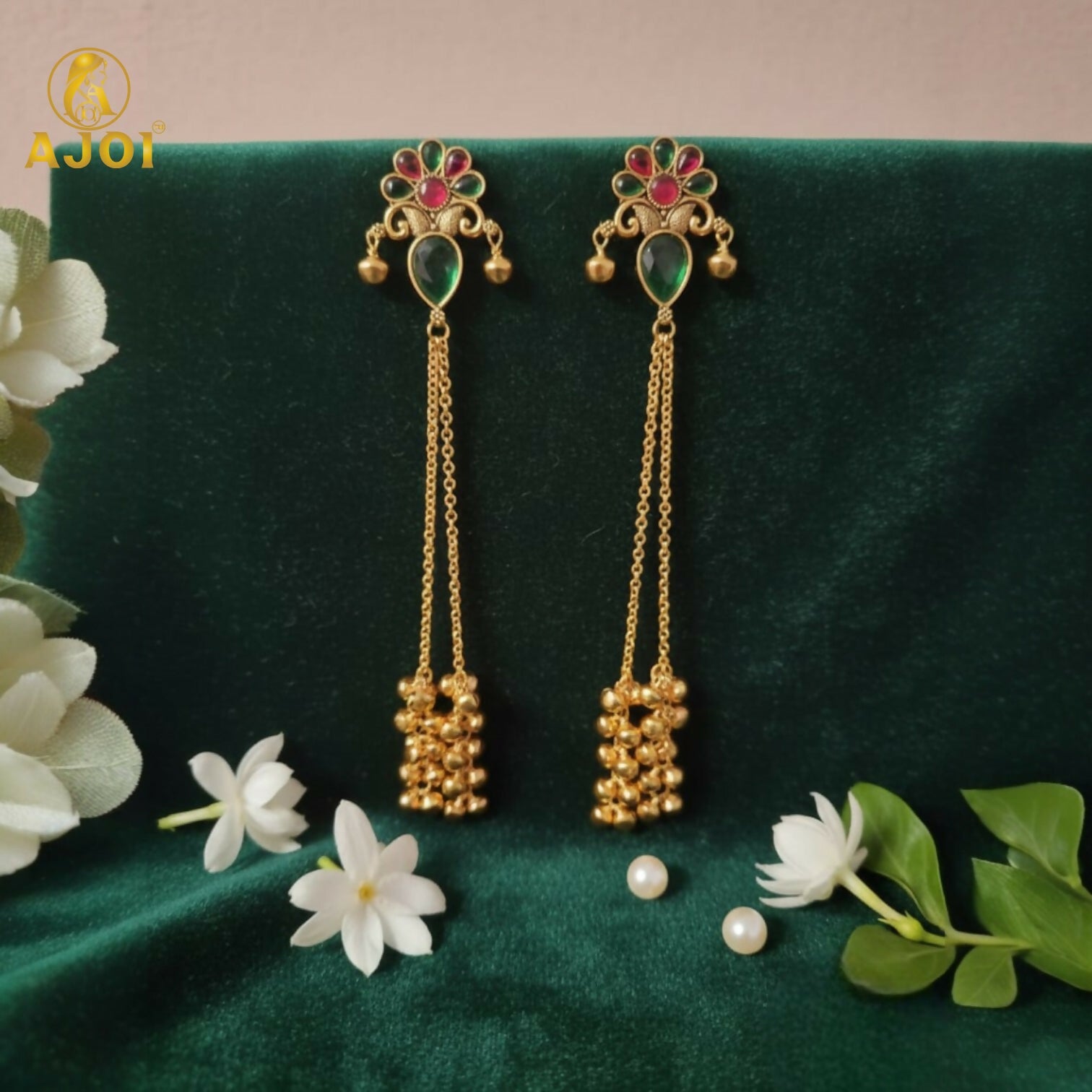 Side view of Kashmiri gold plated latkan earrings highlighting intricate design