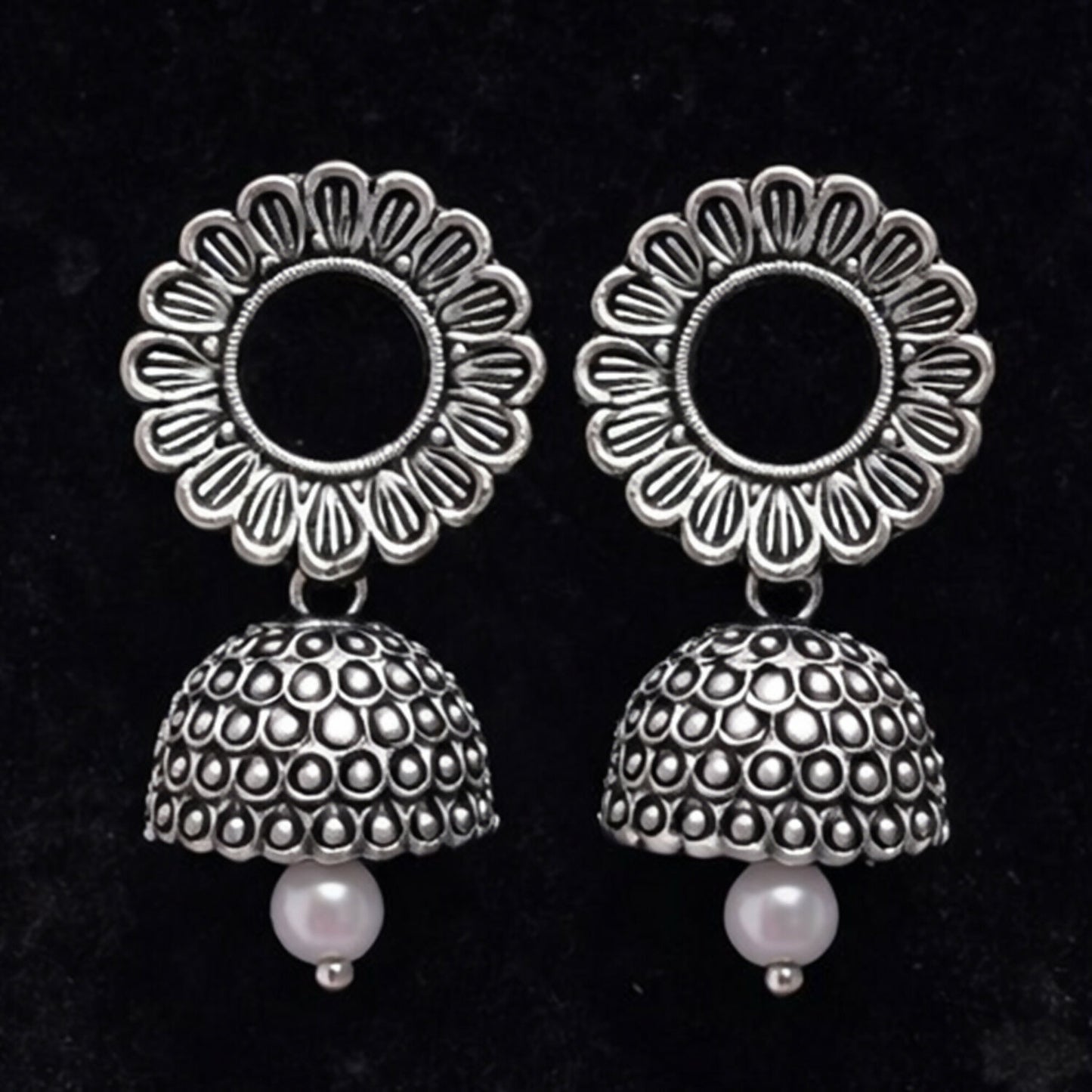 Oxidized silver jhumka earrings styled with ethnic outfit for festive occasions