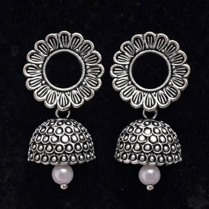 Oxidized silver jhumka earrings styled with ethnic outfit for festive occasions