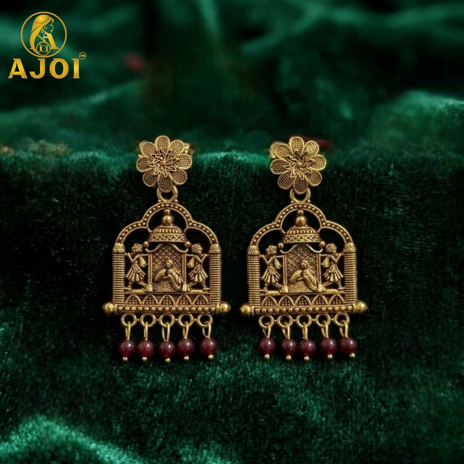 Antique temple earrings worn with traditional ethnic wear