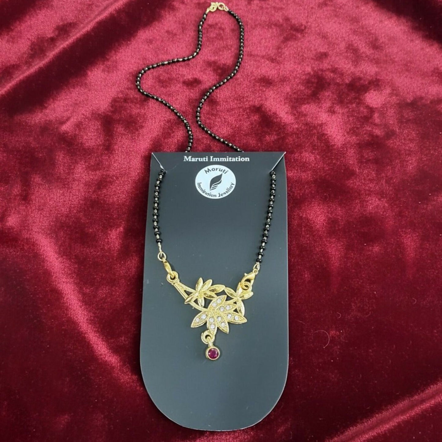 Elegant Gold-Toned Floral Mangalsutra with Stone-Studded Pendant for Women