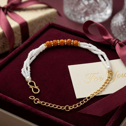 Adjustable gold-toned extension chain with secure S-hook clasp on bracelet