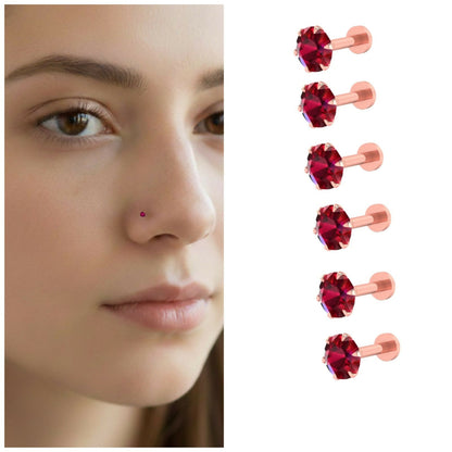 Combo pack of 6 ruby nosepin studs with rose gold plating displayed on white background