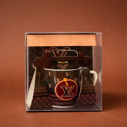 Stylish ceramic mug with detailed print next to its gift box
