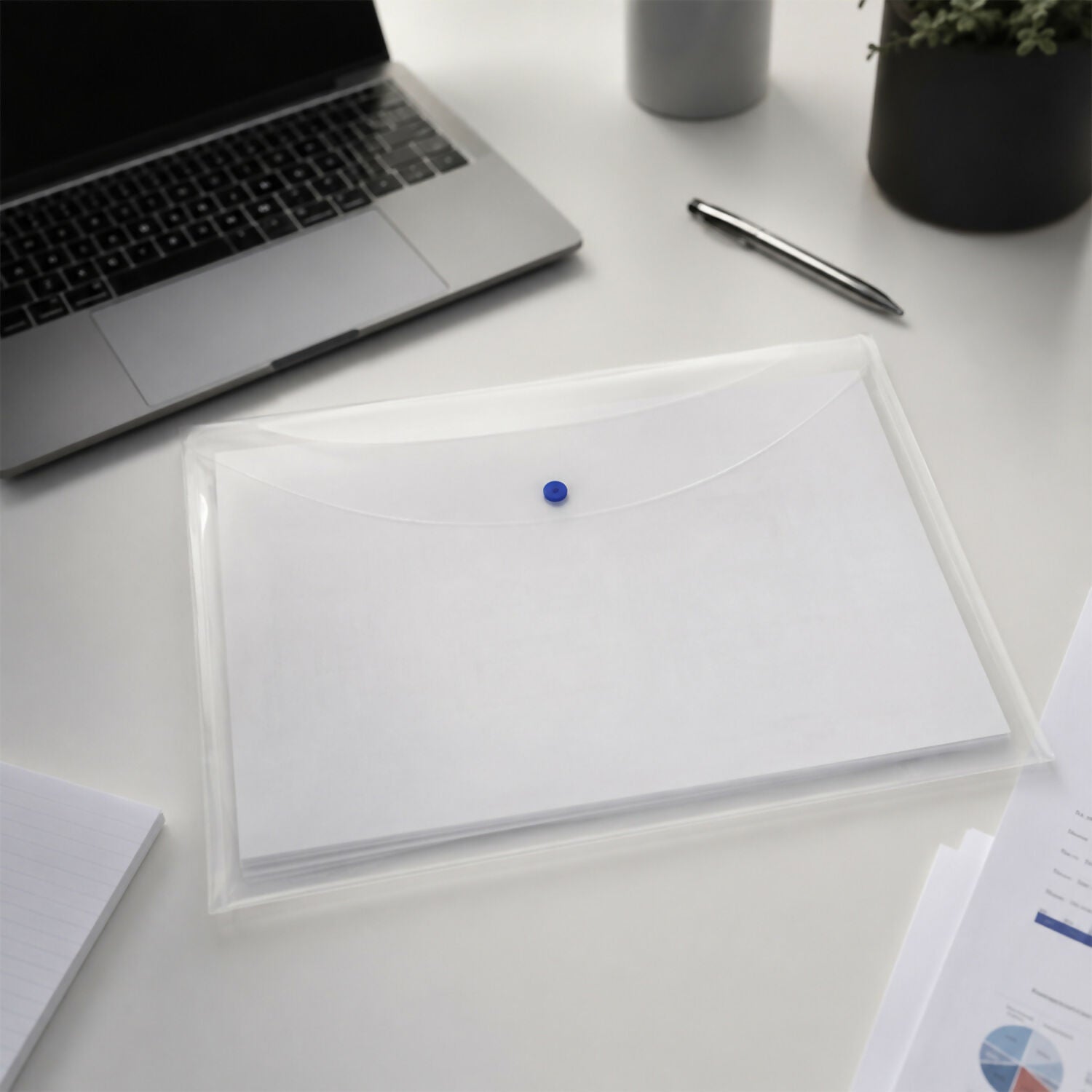 Stack of clear transparent document folders for office