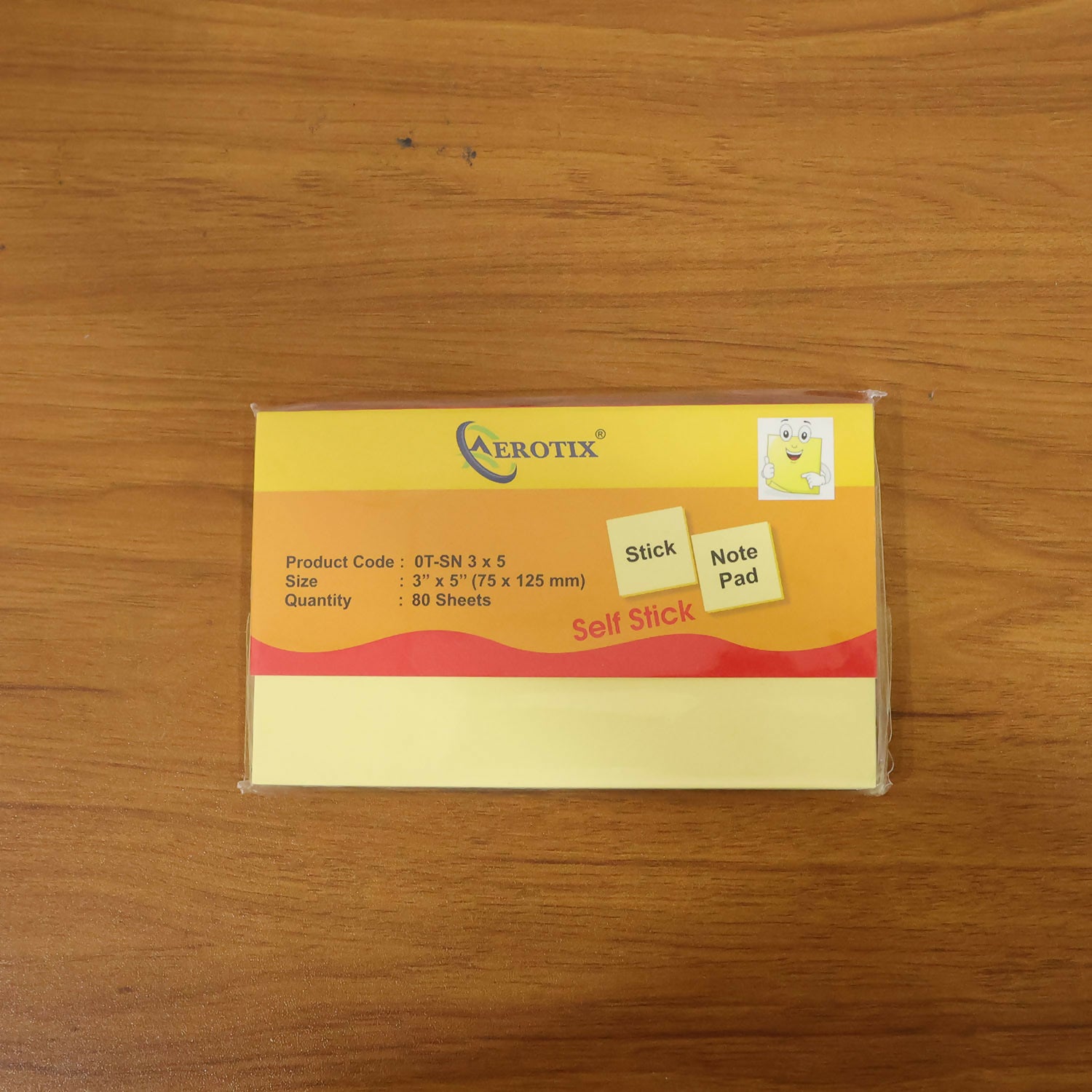 Yellow sticky note sheets peeled easily from pad for use