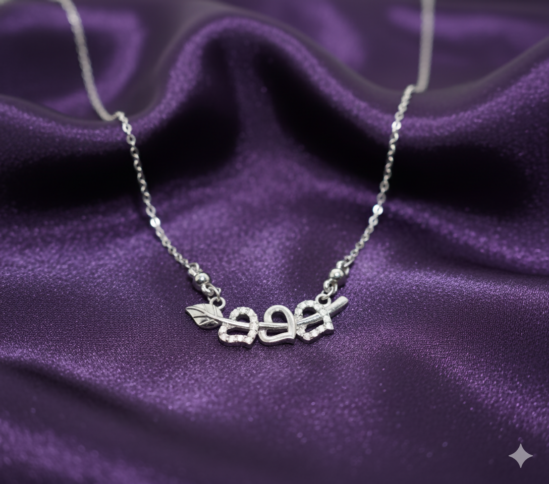 Cupid's Arrow necklace with silver tone double heart pendant and pave CZ stones