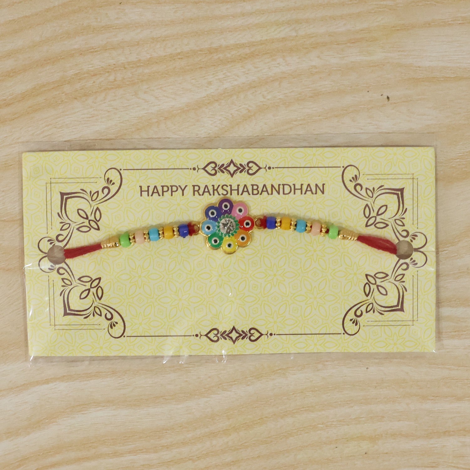 Festive rakhi with flower design and beads
