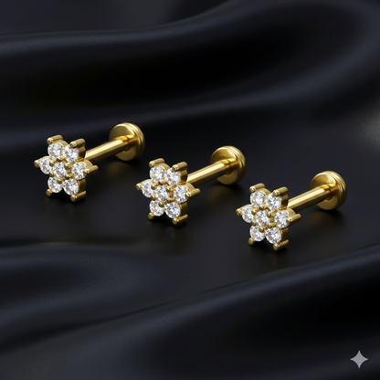 Close-up of gold plated flower cluster with sparkling crystals labret earrings