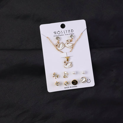 Premium Gold Plated Leaf Pearl Drop Earrings for Women & Girls (Pack Of 7)