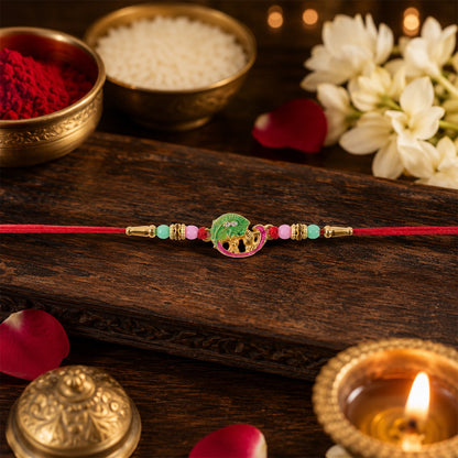 Decorative beads on Mini Krishna Peacock Leaf Rakhi