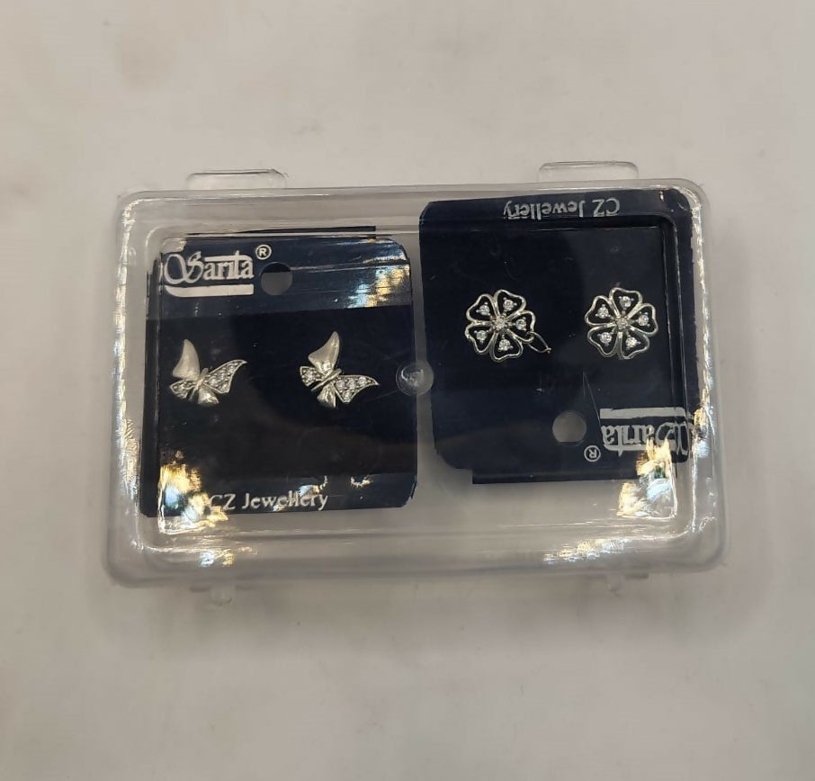 Pair of silver-plated butterfly and floral stud earrings on white background