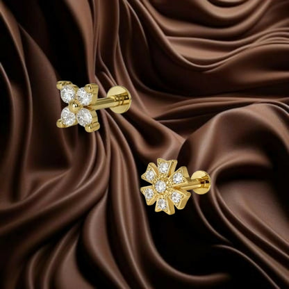 Close-up of intricate 6-petal flower crystal nosepin stud in gold plating