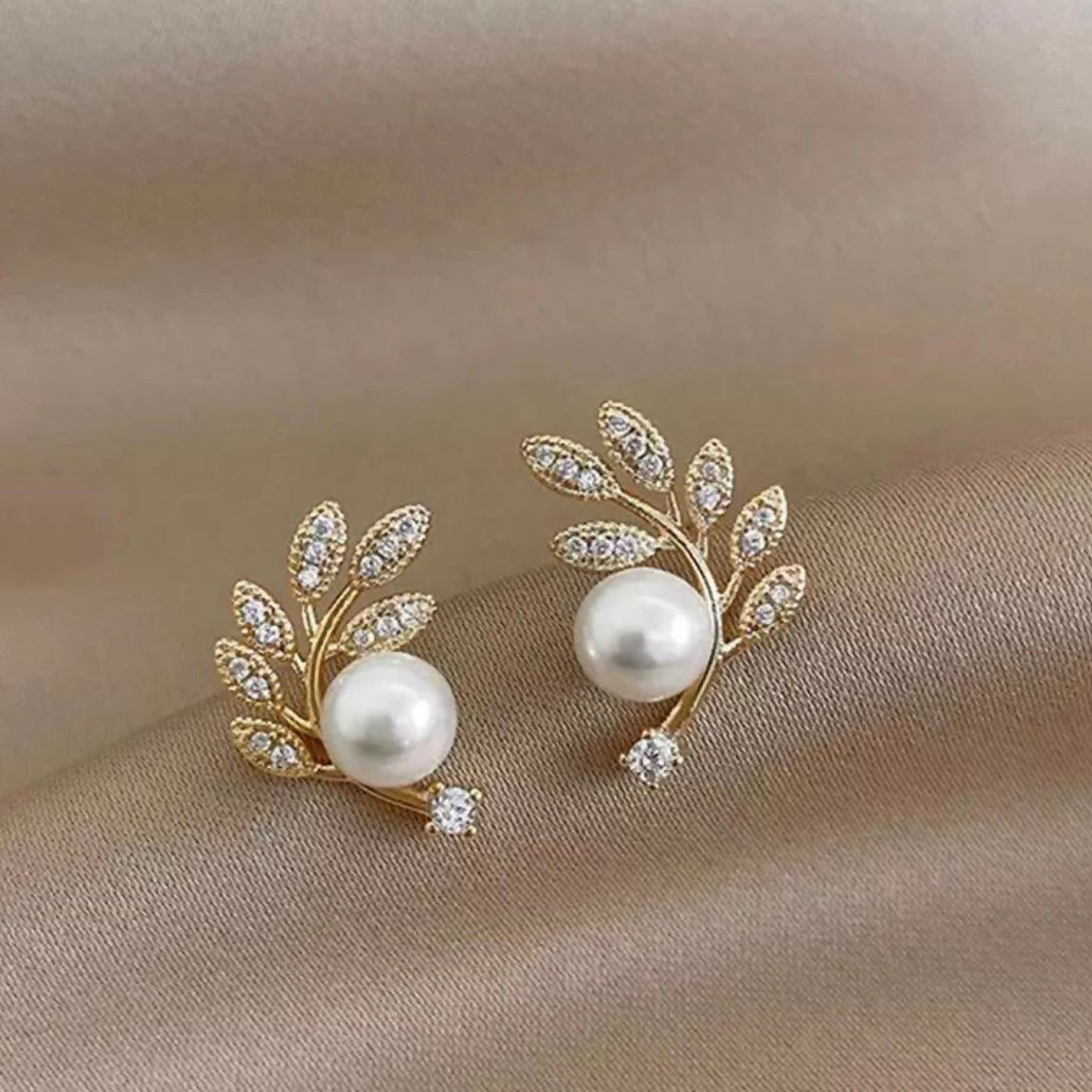 Side angle of 14K gold plated ear climbers
