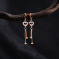 Crystal Heart Tassel Earrings – Elegant Rose Gold Drop Design