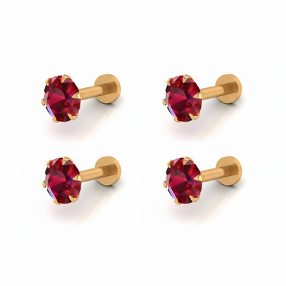 Ruby nose stud showing comfortable flat-back labret design for secure wear