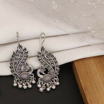 Four pairs of pearl oxidised jhumka earrings for festive occasions