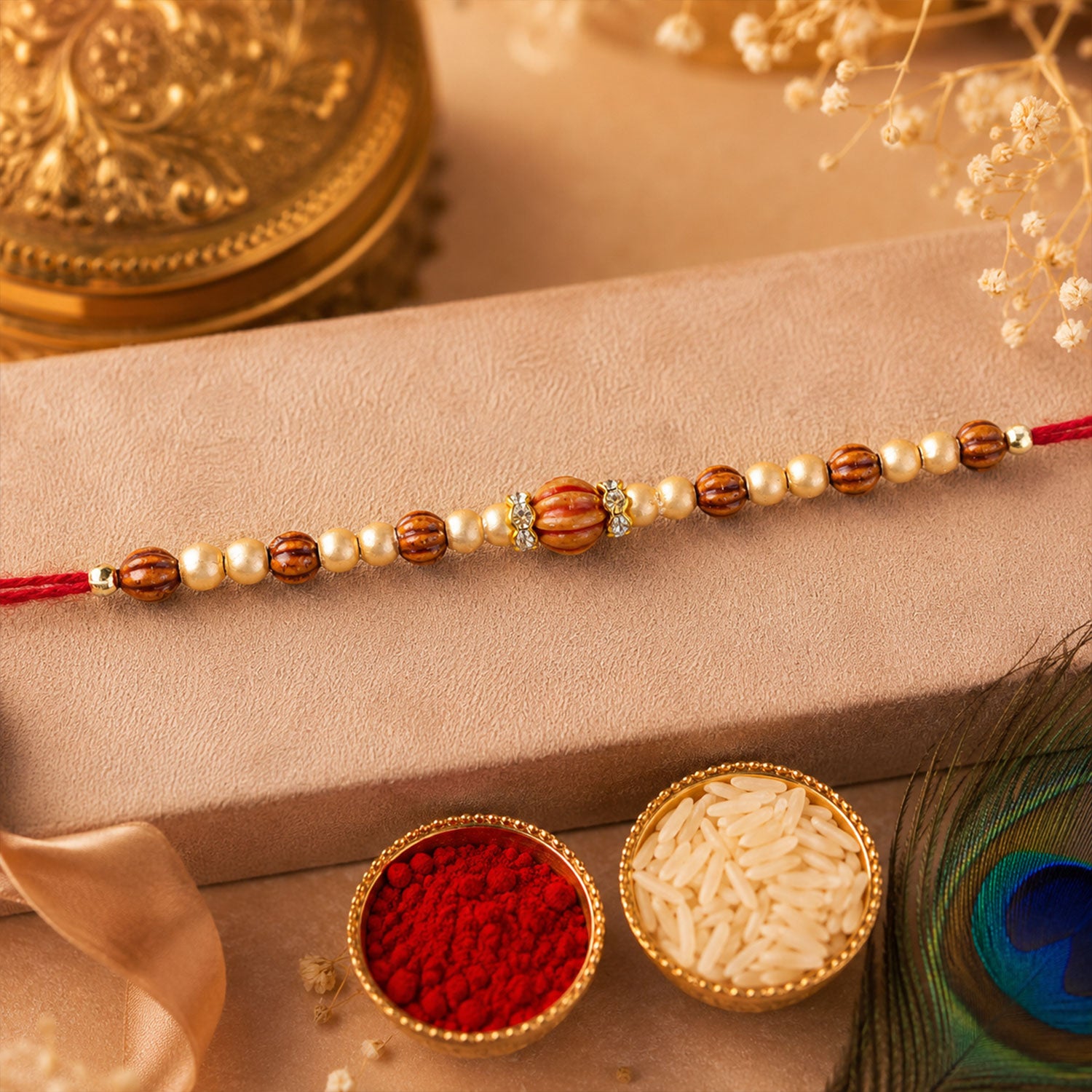Red Thread Rakhi with Wooden Bead Pendant and Golden Bead Accents
