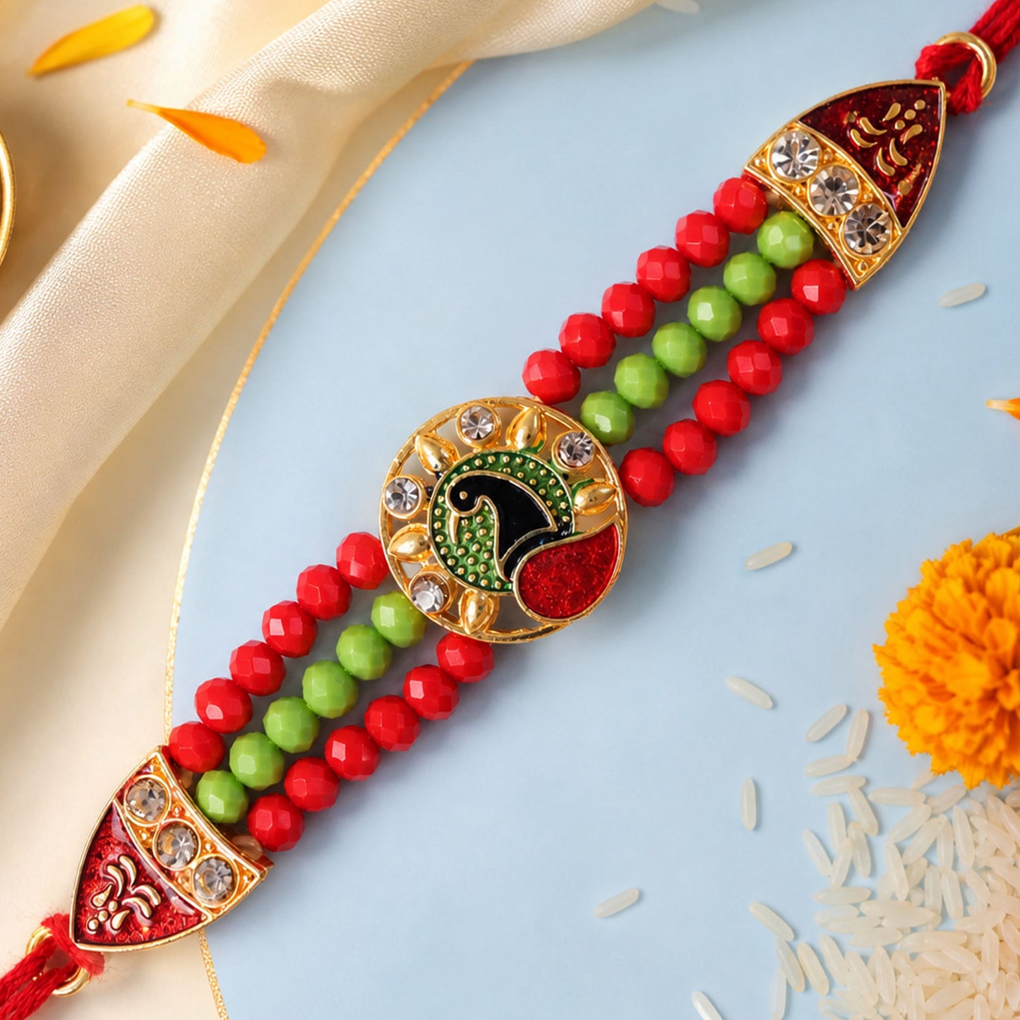 Red Green Beaded Rakhi with Gold Medallion and Bright Traditional Festive Gift Style