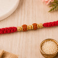 Designer Rakhi – Studded Centre & Festive Beads for Raksha Bandhan