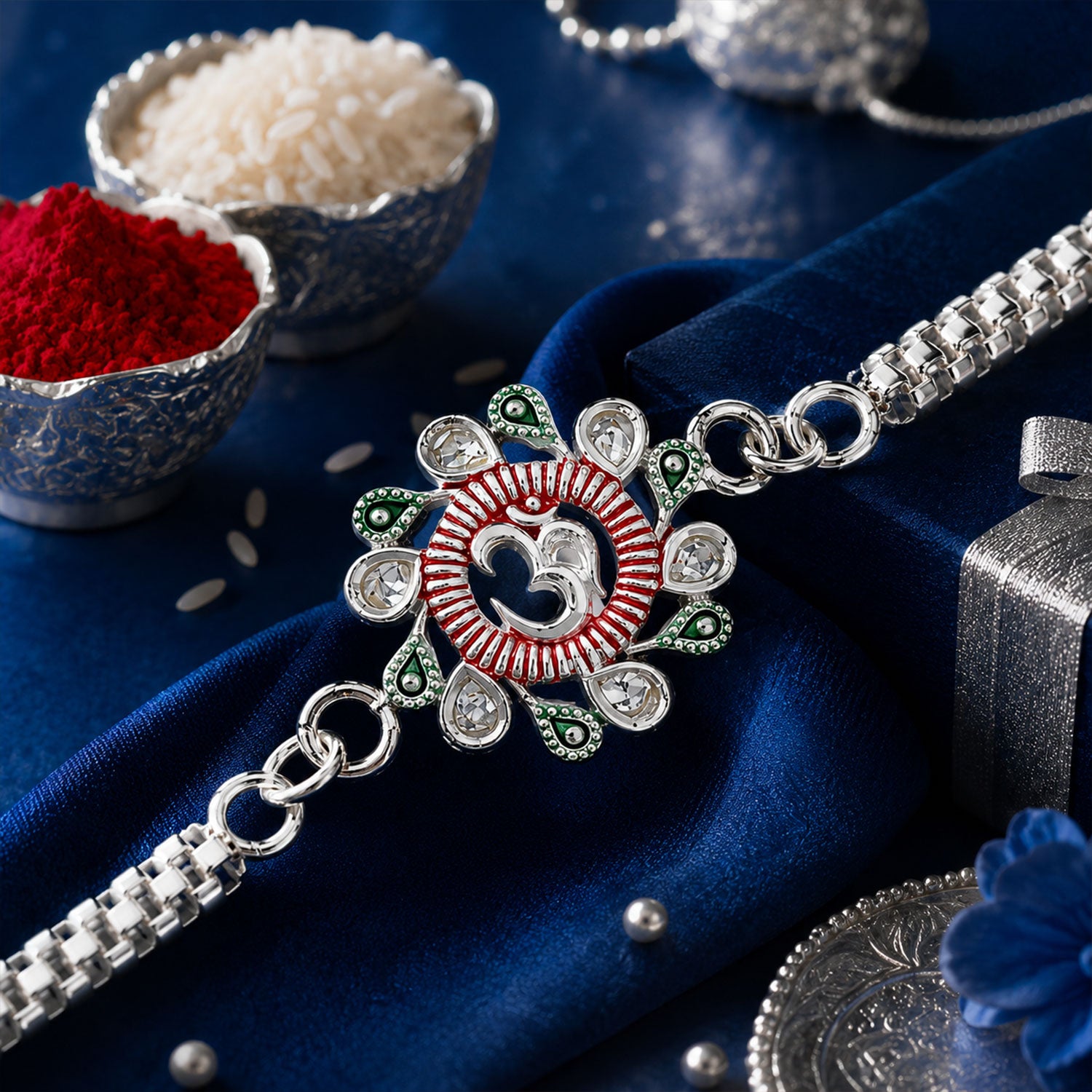 Elegant Floral Om Rakhi with pink and green accents on a dark background.