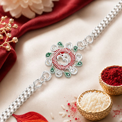 Floral Om Rakhi displayed on a hand, ready for Raksha Bandhan celebration.