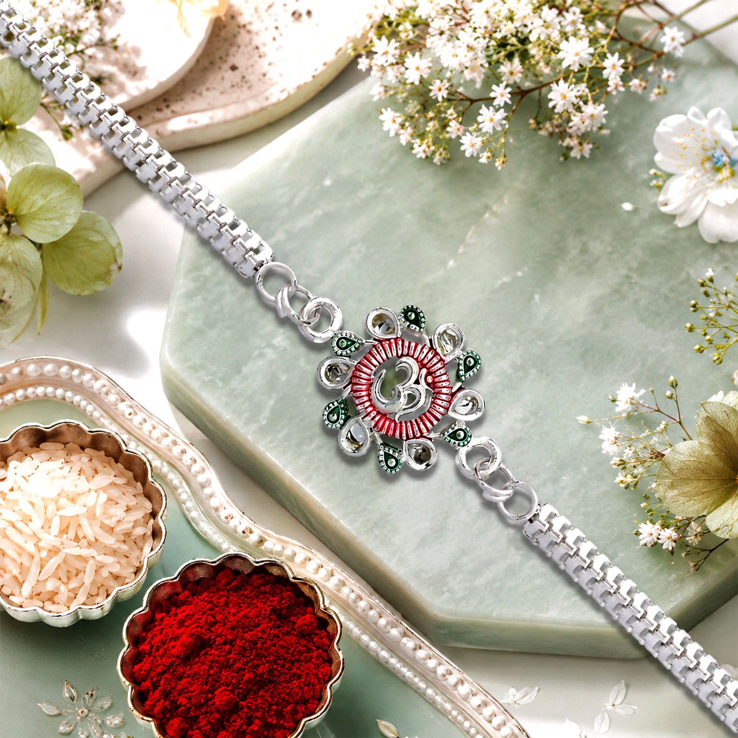Floral Om Rakhi – Elegant Design for Brothers, Pink-Green Accents