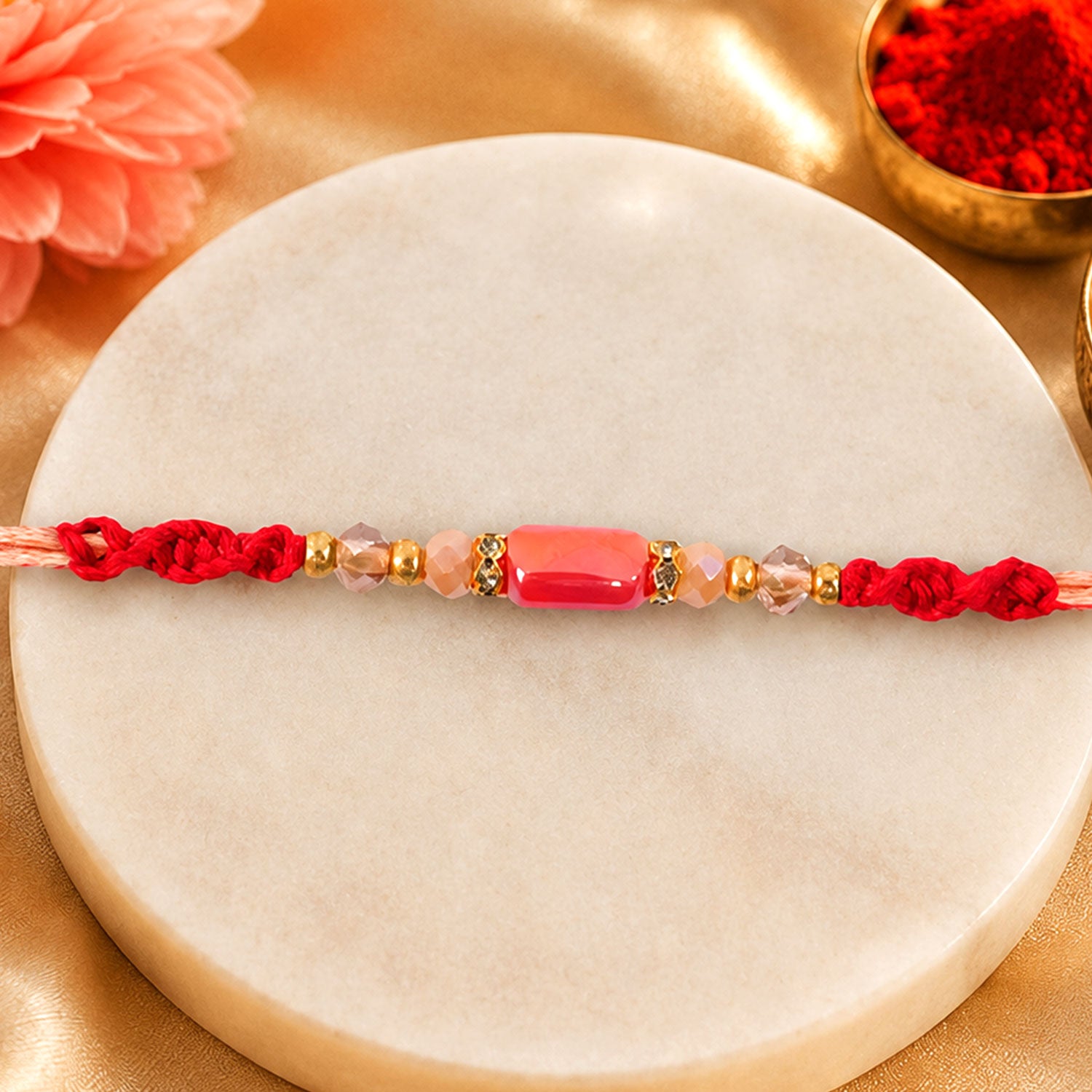 Sparkling Pearl Stone Rakhi with Colorful Thread and Premium Festive Beauty