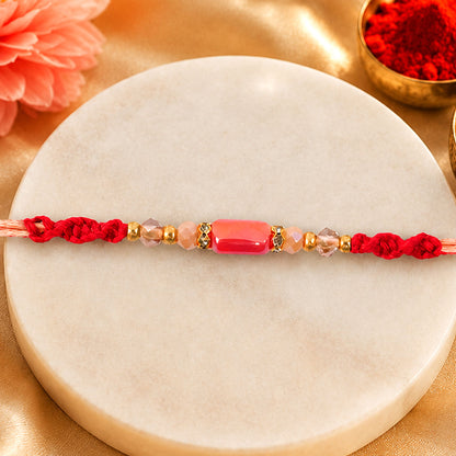 Sparkling Pearl Stone Rakhi with Colorful Thread and Premium Festive Beauty