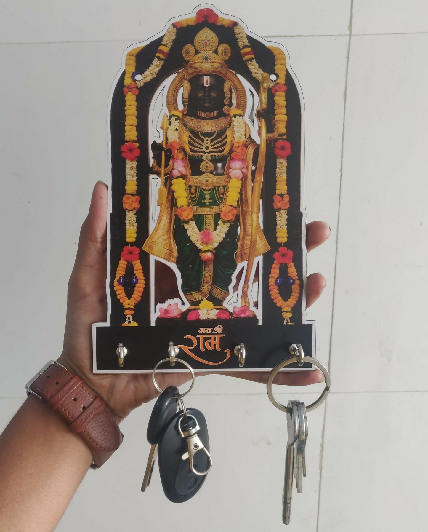 Stylish handcrafted wooden idol wall key holder, ideal for organizing keys and accessories