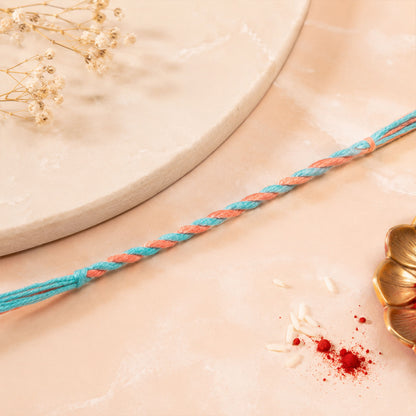Peach-Turquoise Twisted Cord Rakhi with Beadless Pastel Design