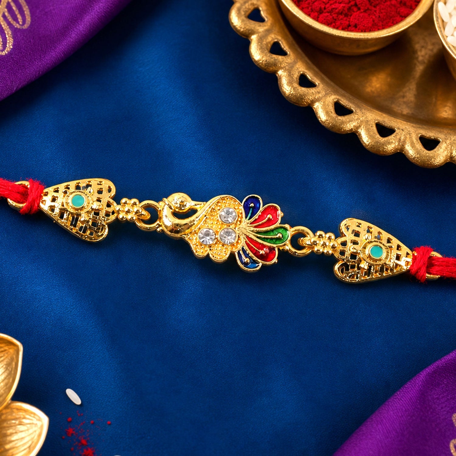 Gold-Toned Peacock Rakhi with Colorful Enamel and Stones for Raksha Bandhan (5pcs)