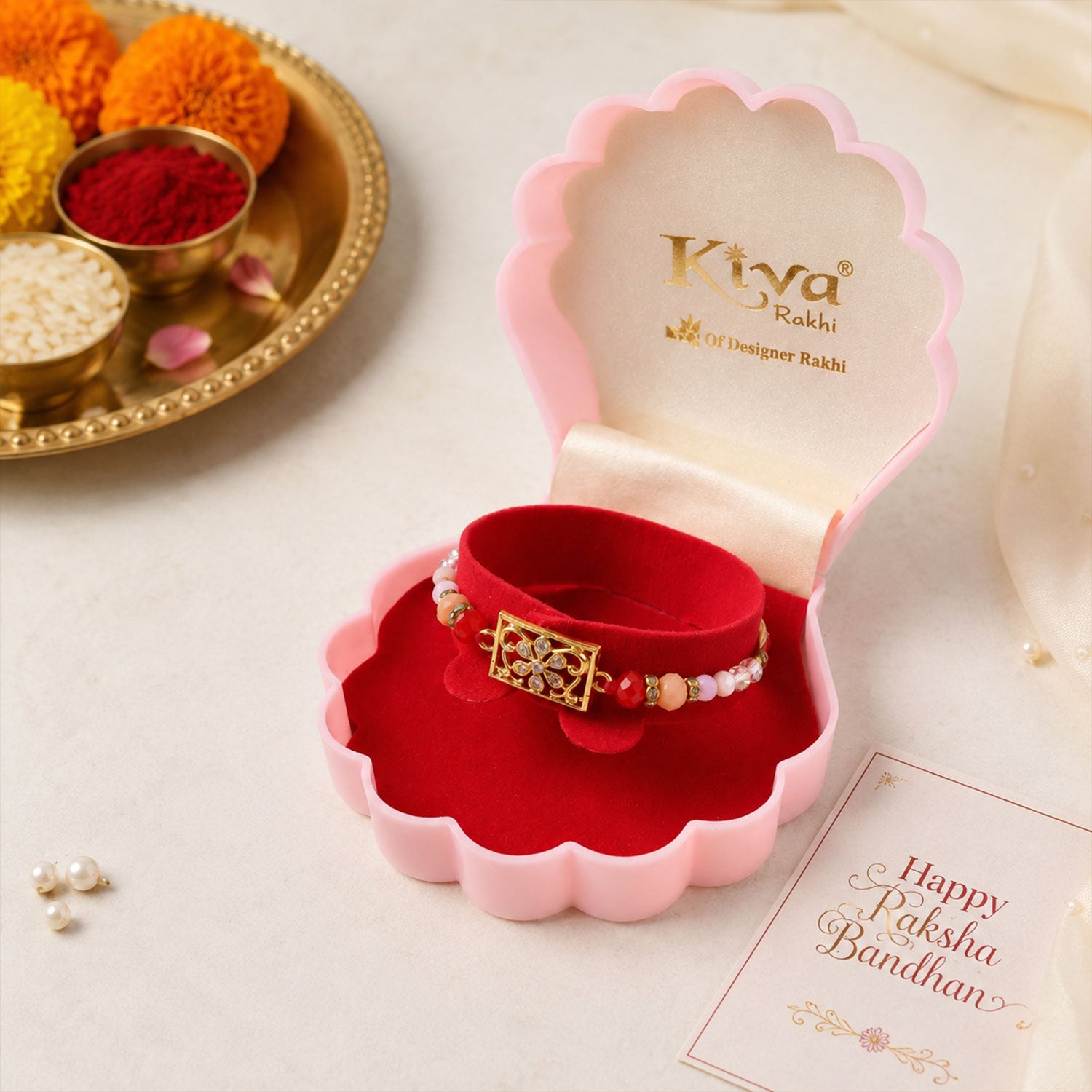 Rectangular AD Filigree Designer Rakhi for Brother with Pink Beads Gift