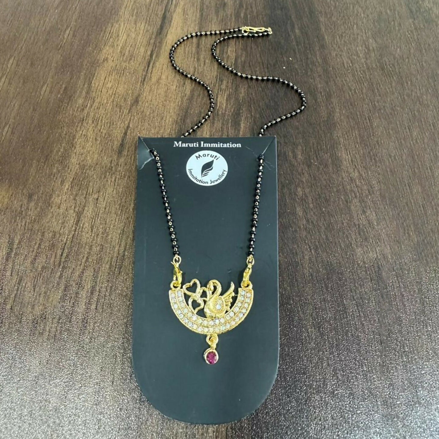 Graceful Swan Design Gold-Toned Mangalsutra with Stone-Studded Pendant