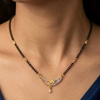 Gold and Diamond Floral Curved Mangalsutra with Single Black Bead Chain