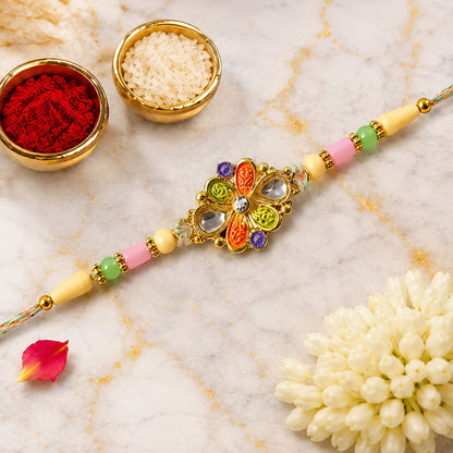 Orange and Green Enamel Flower Pendant Rakhi with Kundan Teardrop Stones