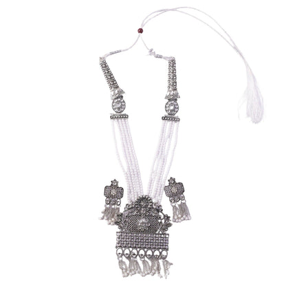 Detailed view of pearl accents on necklace