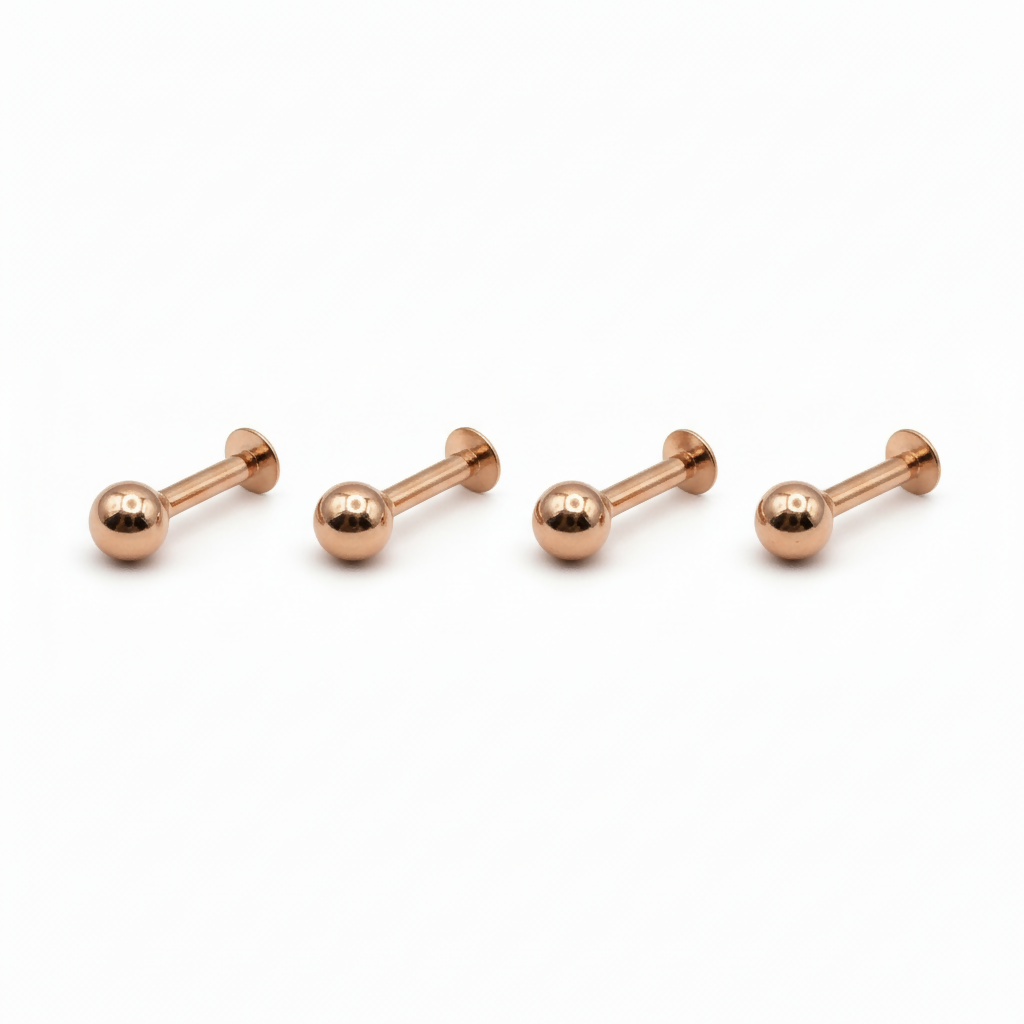 Variety of rose gold nosepin studs displayed, perfect for nose and ear piercings