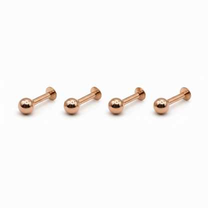 Variety of rose gold nosepin studs displayed, perfect for nose and ear piercings