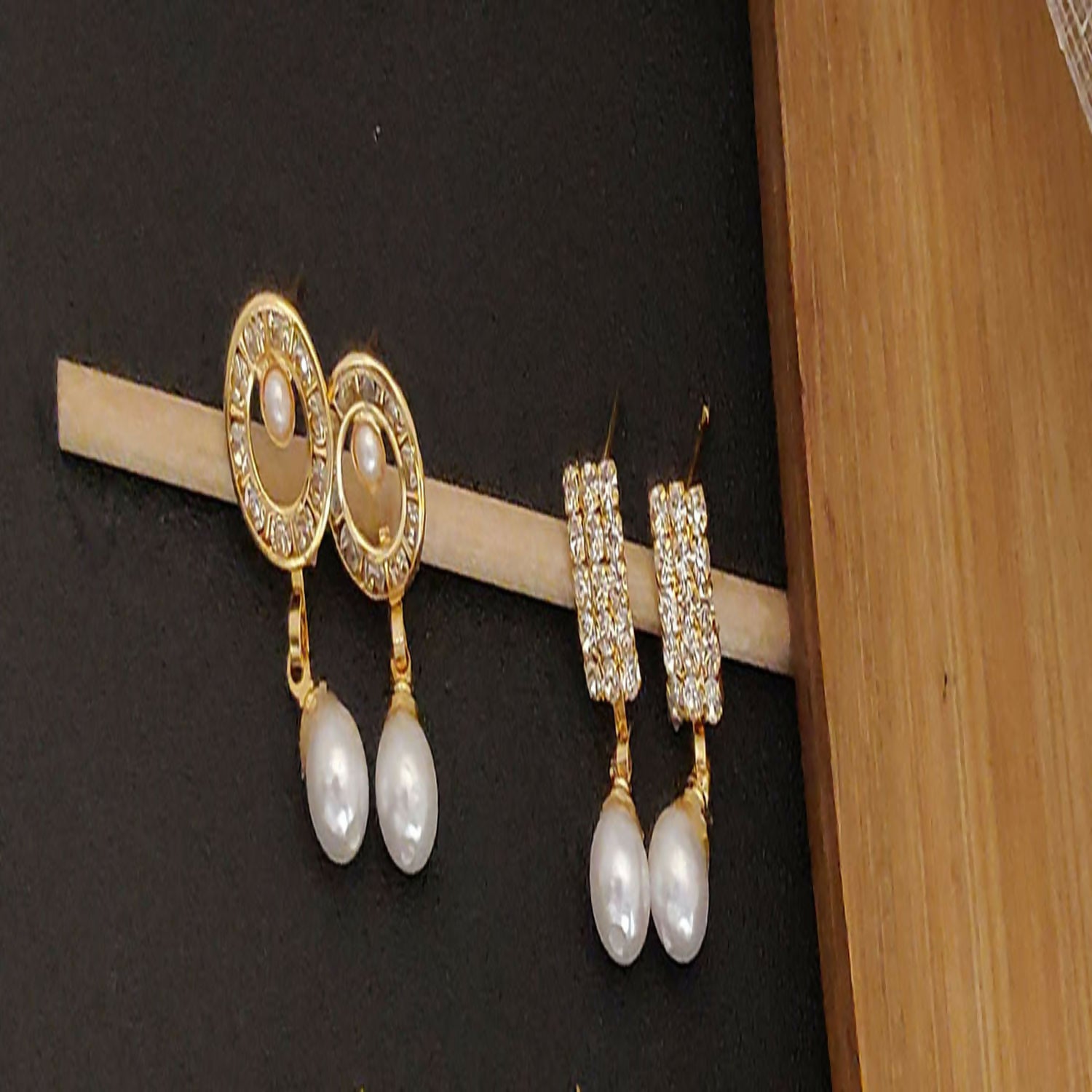 Gold plated jhumka earrings enhancing ethnic Indian outfits for women and girls