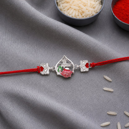 Silver Crown Rakhi with Pink Stone Center and Red Mauli Thread