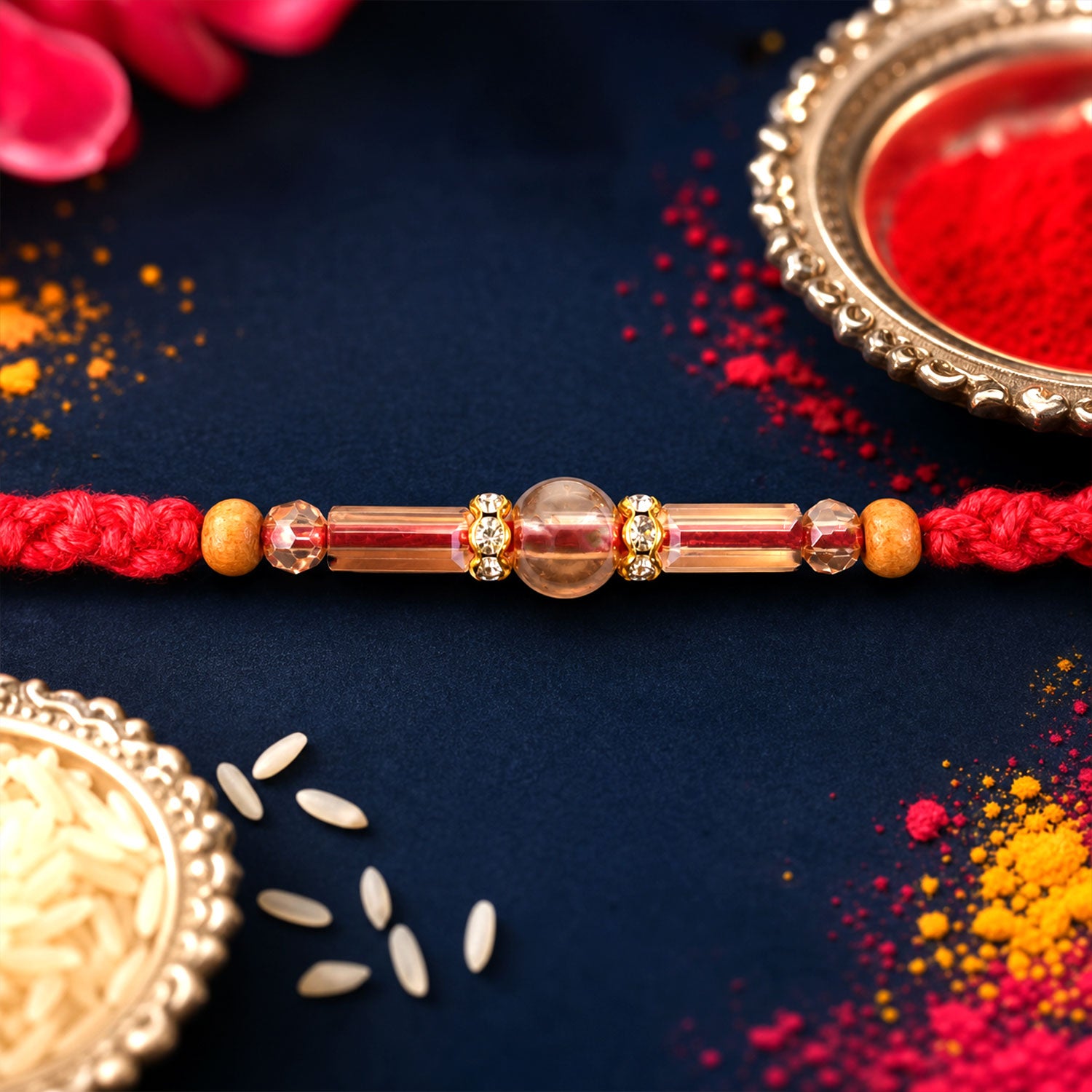 Red Braided Rakhi with Wooden Beads and a Pink Crystal Cylinder Bead