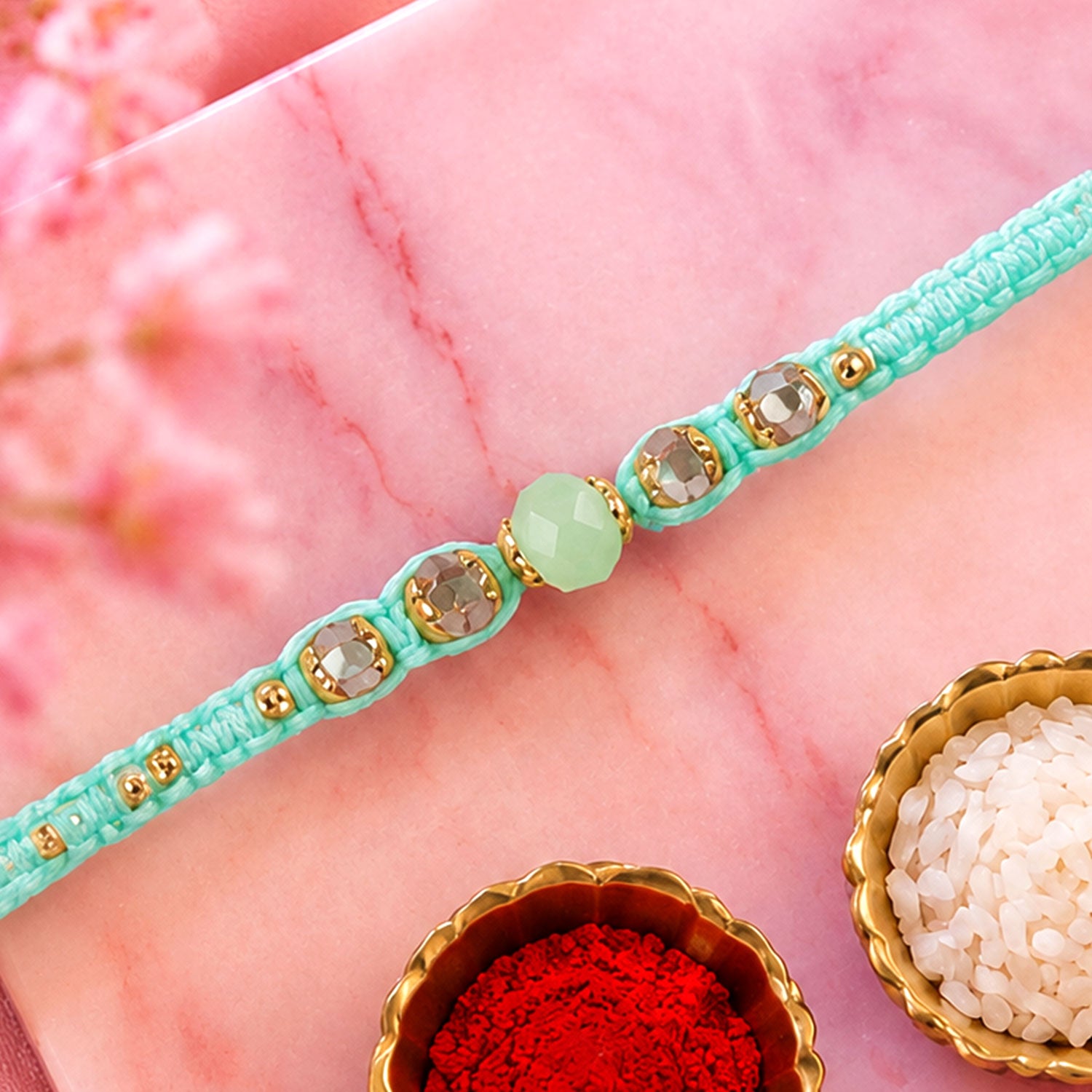 Beautiful Pearl and Stone Rakhi with Bright Beads and Elegant Raksha Bandhan Look