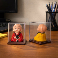Solar Monk Bobble Head with Moving Head in Clear Display Case (Color may vary)