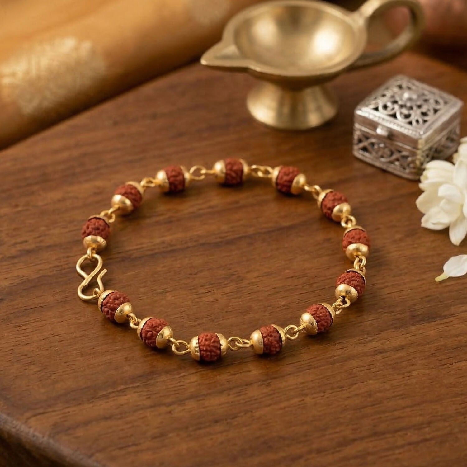 Circular pendant detail on Rudraksha necklace
