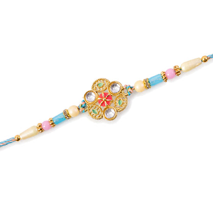 Blue Pink Floral Rakhi with Gold Medallion and Soft Festive Brother Gift Styling