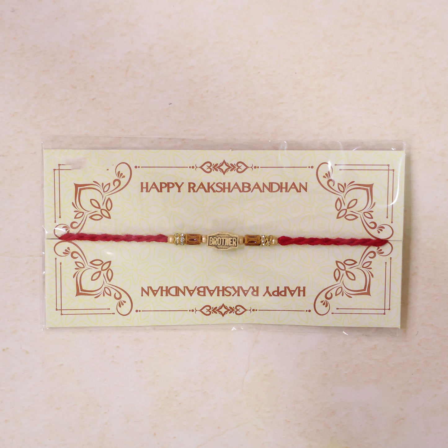 Red Thread Rakhi with Wooden Beads and a Personalised 'Brother' Charm