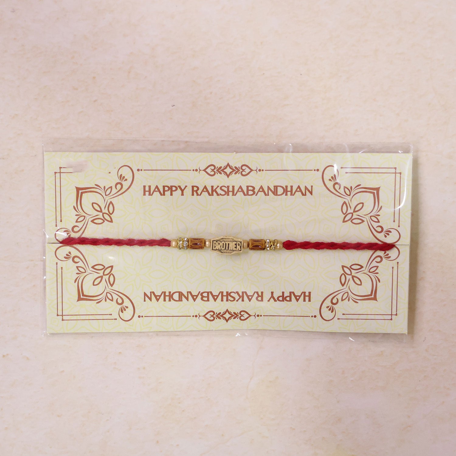 Red Thread Rakhi with Wooden Beads and a Personalised 'Brother' Charm